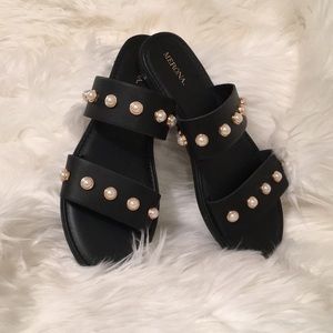 Slide into summer in the cute black pearl sandals!